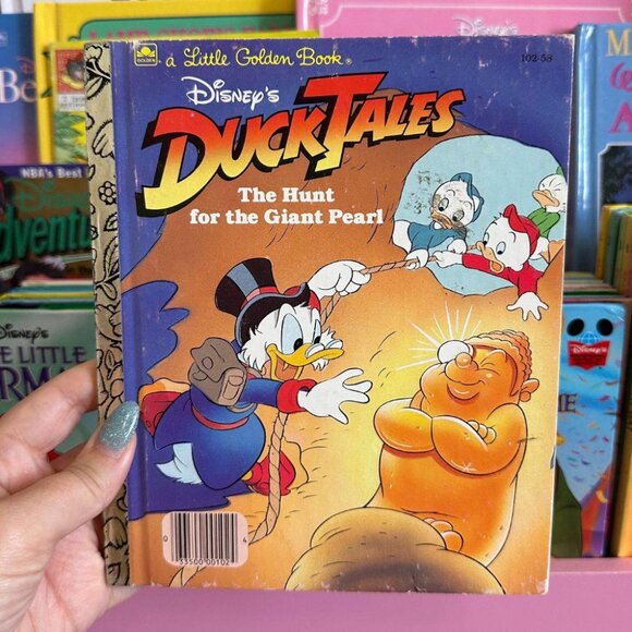 DUCK TALES THE HUNT FOR THE GIANT PEARL GOLDENBOOK - Picture 1 of 4